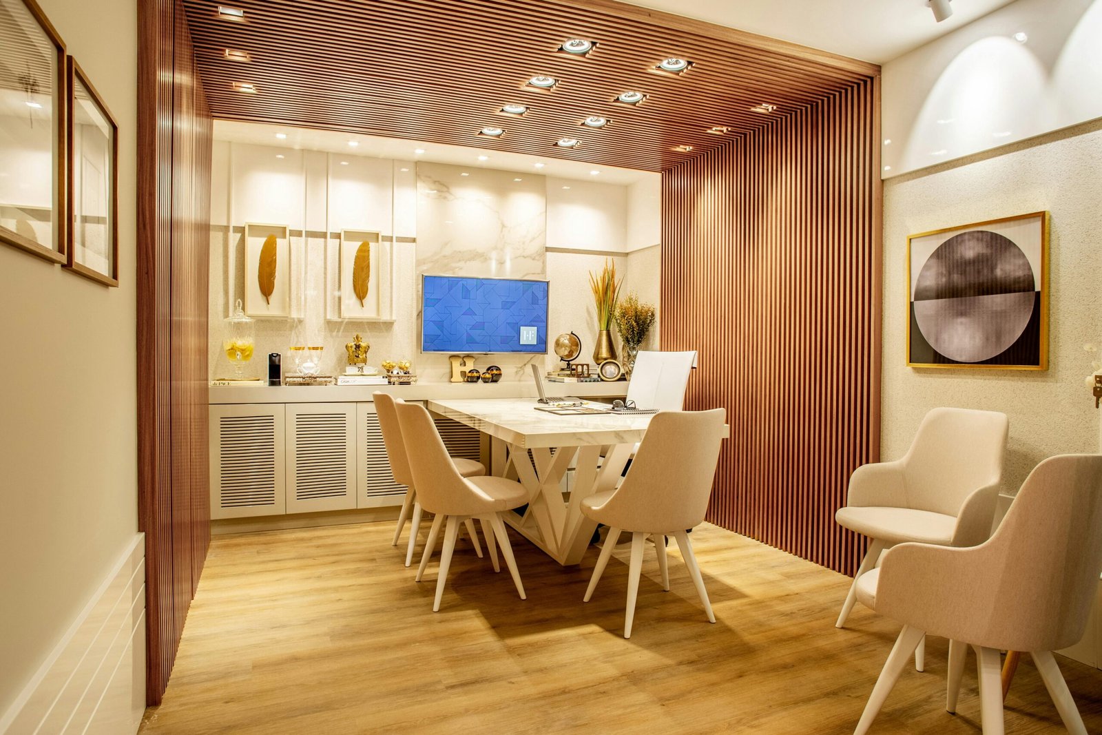 Modern dining room with elegant decor, featuring a stylish table and chairs set, cozy lighting, and artwork.